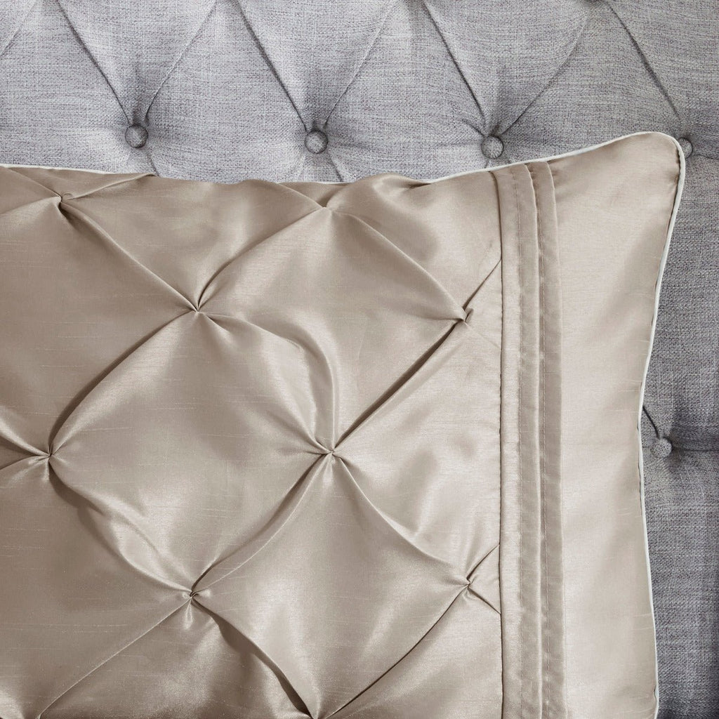 King Laurel tufted comforter set by Anthony & Home showing a plush, textured fabric with a tufted design on a neatly made bed.