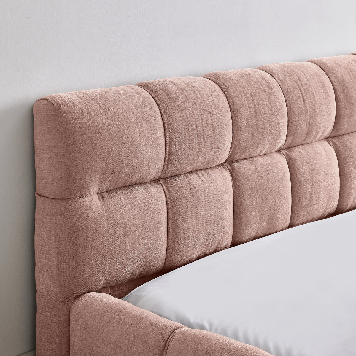 Pink upholstered queen bed frame from Anthony & Home's Limited Chenille Collection, no box spring needed, stylish and comfortable.