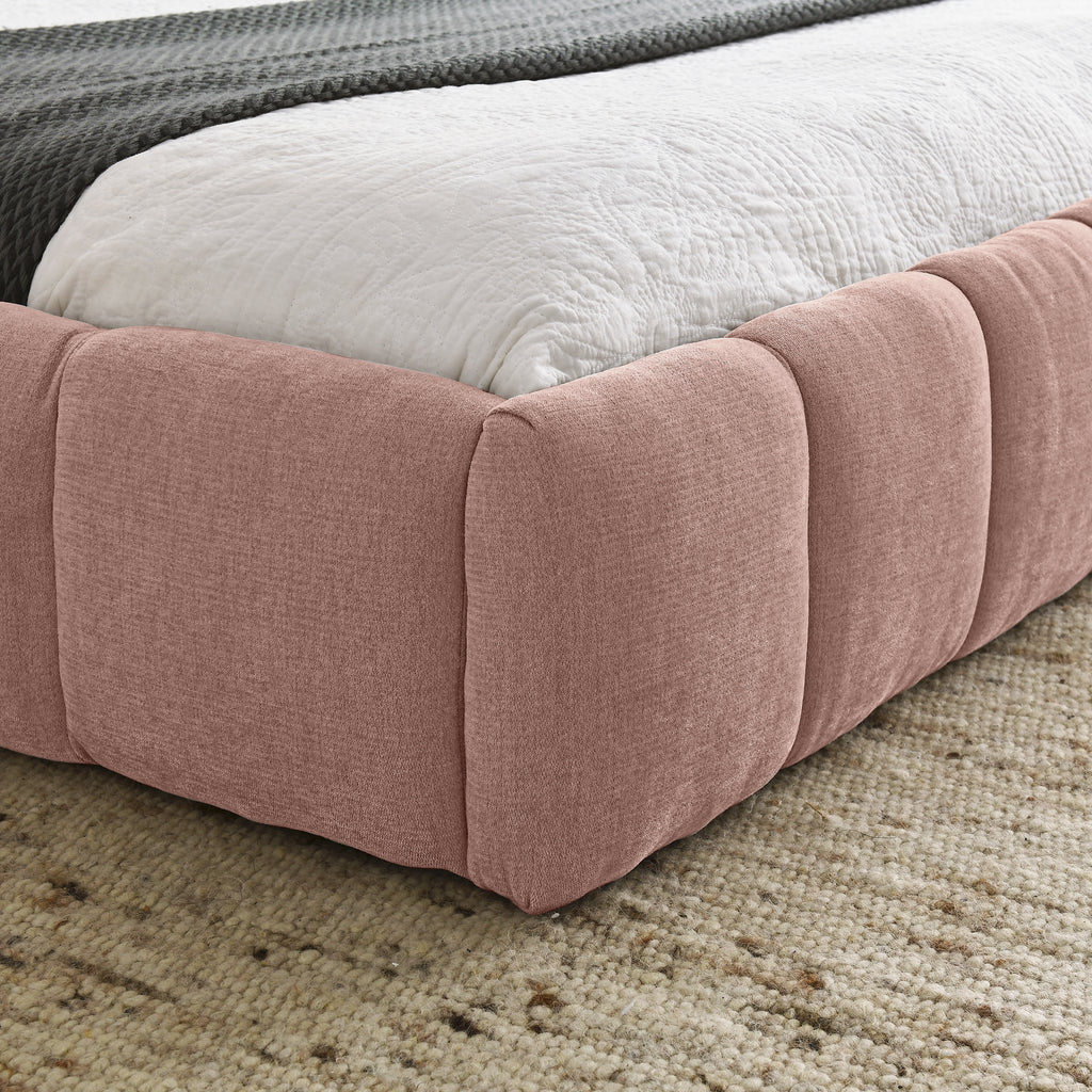Pink upholstered queen bed frame from Anthony & Home's Limited Chenille Collection, no box spring needed, showcasing plush fabric and elegant design.