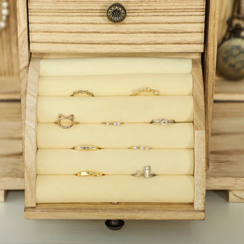 Limited edition Atelier Paulownia wood jewelry box by Anthony & Home with intricate design and interior compartments.