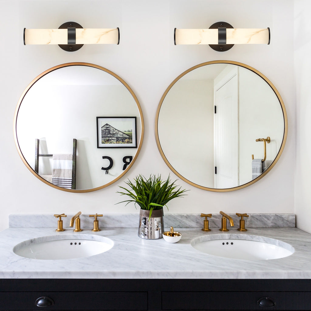 Set of two Atelier Resin Marble Wall Sconces by Anthony & Home featuring matte black iron frames and elegant resin marble accents.