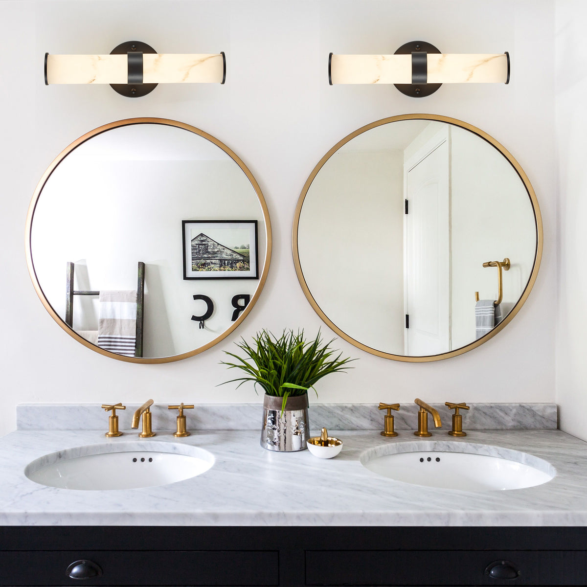 Set of two Atelier Resin Marble Wall Sconces by Anthony & Home featuring matte black iron frames and elegant resin marble accents.