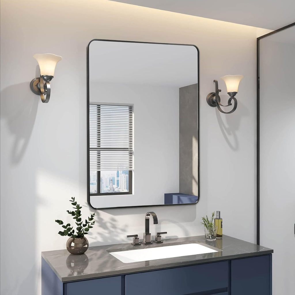 Black aluminum frame bathroom mirror, 24x36 inches, by Anthony & Home, with sleek modern design and reflective glass surface.