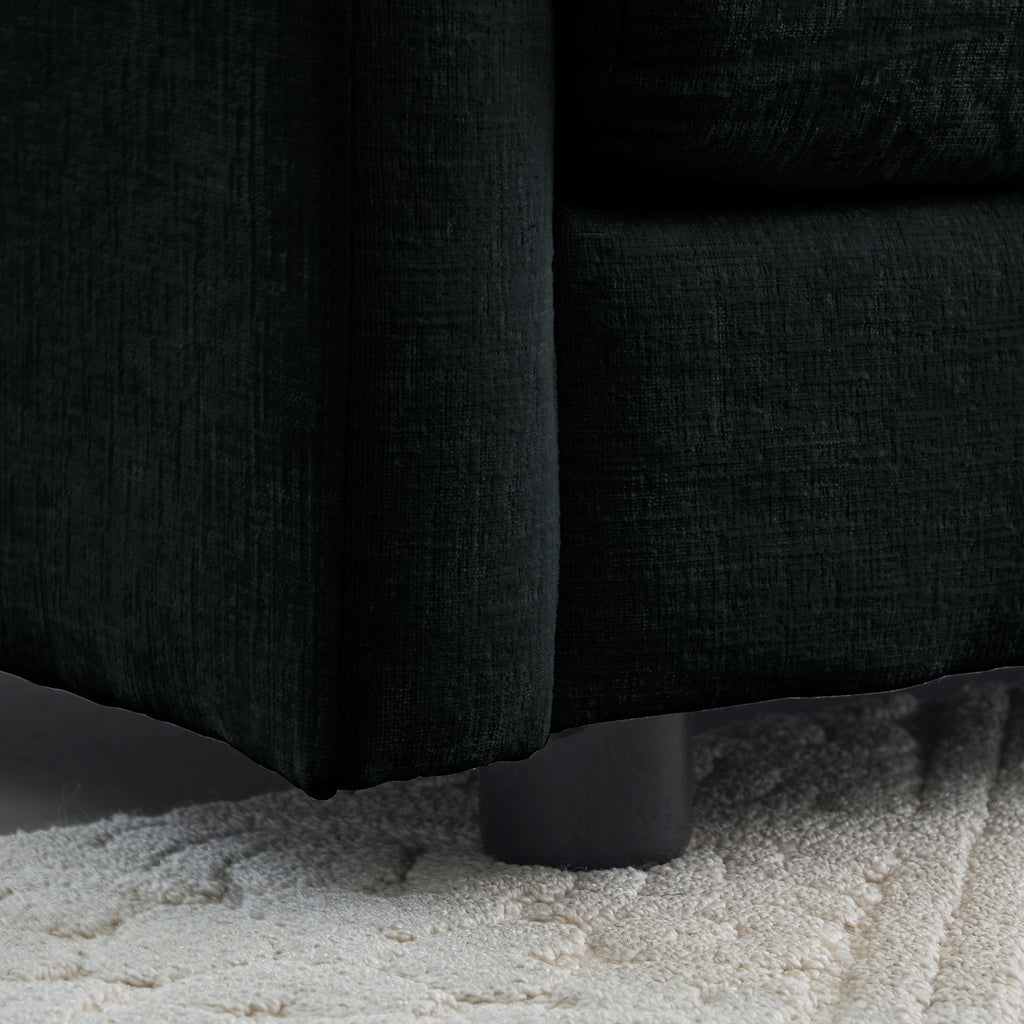 Anthony & Home black chenille oversized L-shaped sectional with reversible ottoman, showcasing plush upholstery and modern design.