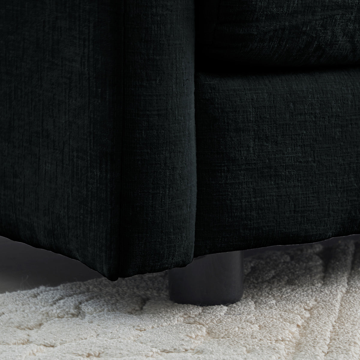 Anthony & Home black chenille oversized L-shaped sectional with reversible ottoman, showcasing plush upholstery and modern design.