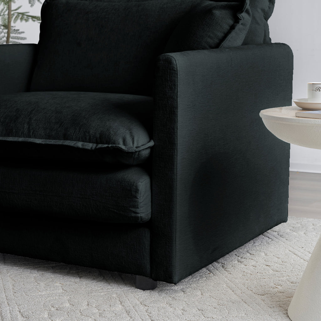 Anthony & Home limited edition black chenille oversized L-shaped sectional with reversible ottoman, showcasing plush modular design.