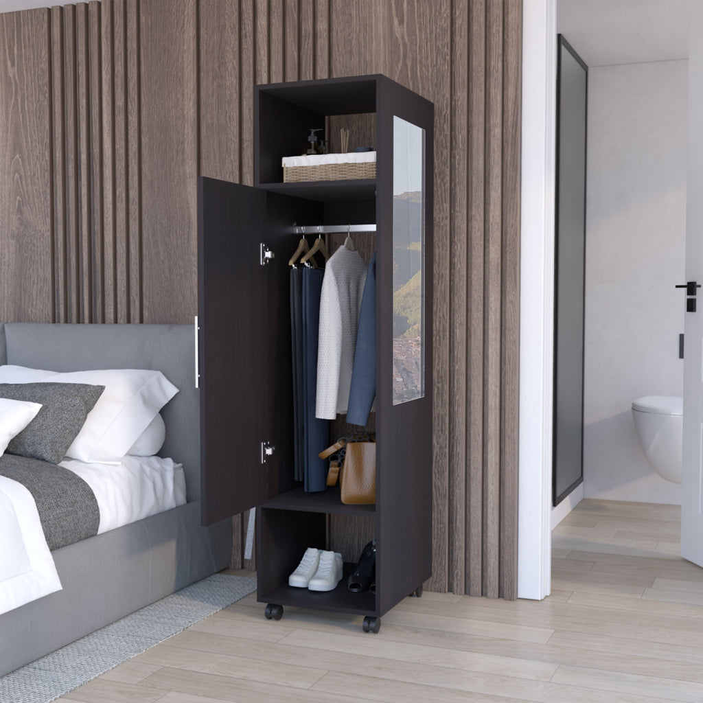 Limited edition matte-black armoire with mirror from Anthony & Home showcasing sleek design and reflective surface.