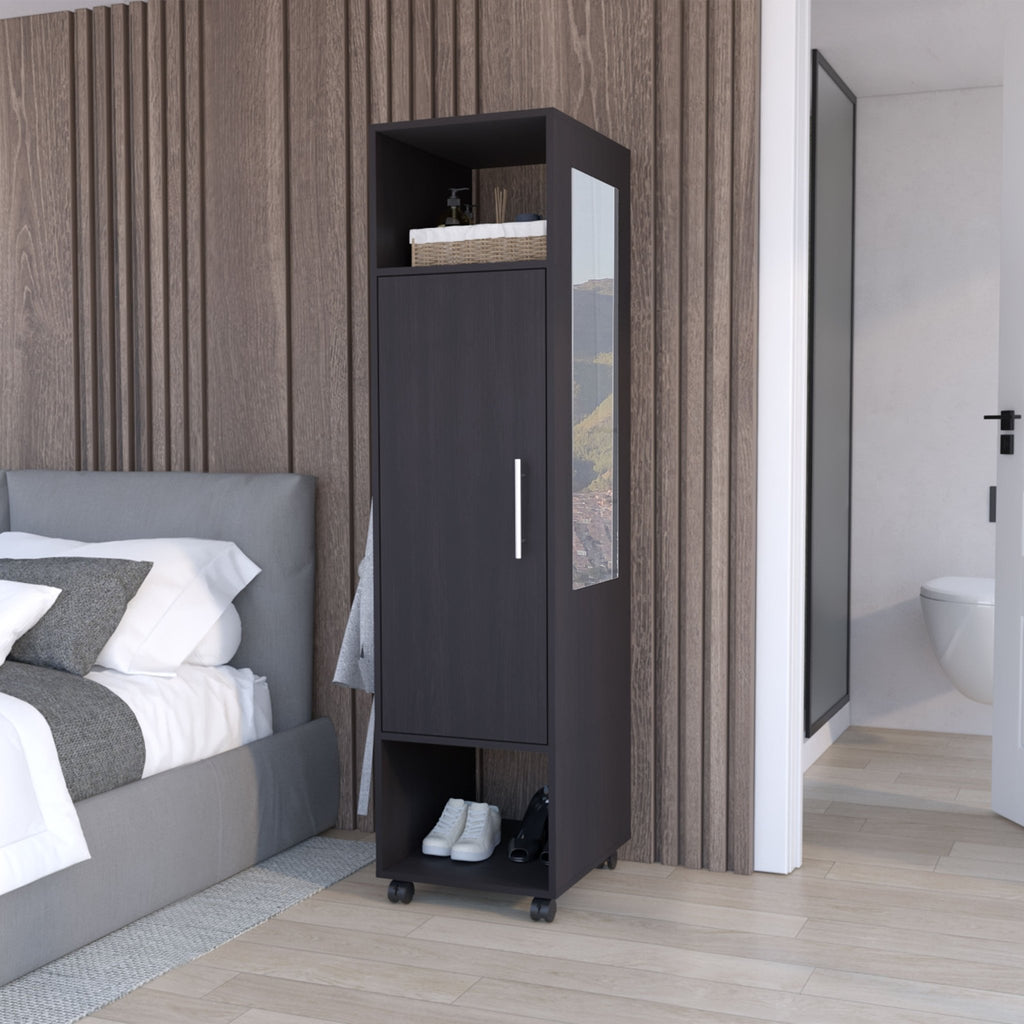 Limited edition matte-black armoire with mirror from Anthony & Home, showcasing sleek design and reflective door surface.