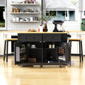 Matte black kitchen island with drop leaf, limited edition Anthony & Home furniture, showcasing a modern design with a smooth surface.