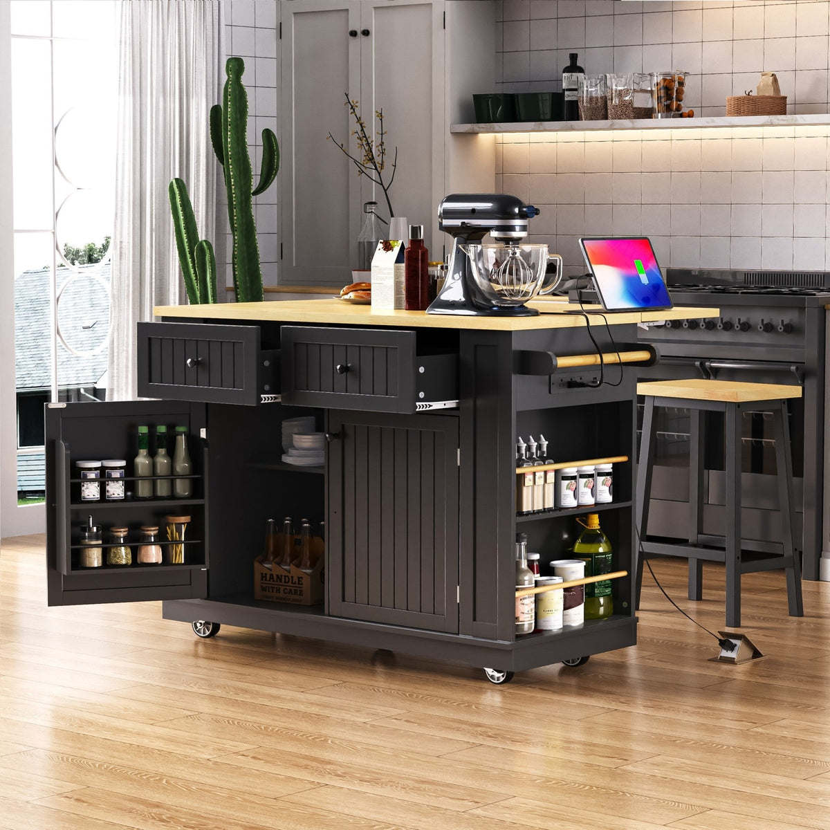 Matte black kitchen island with drop leaf and storage from Anthony & Home, showcasing a modern, sleek design ideal for cooking spaces.