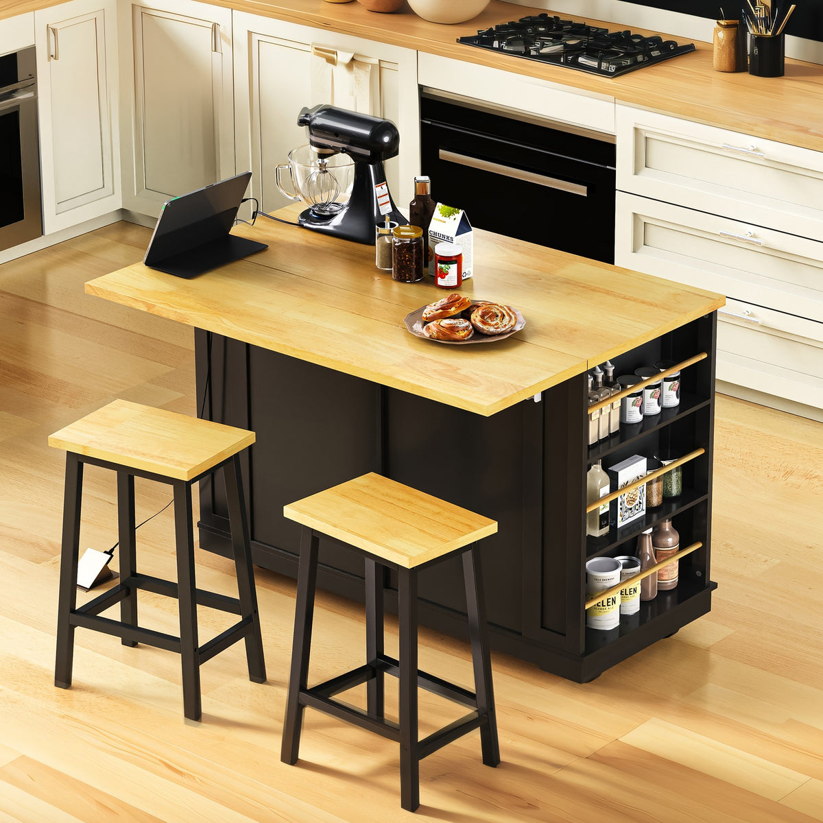 Matte black limited edition kitchen island with drop leaf, Anthony & Home, showcasing a modern, functional kitchen furniture piece.