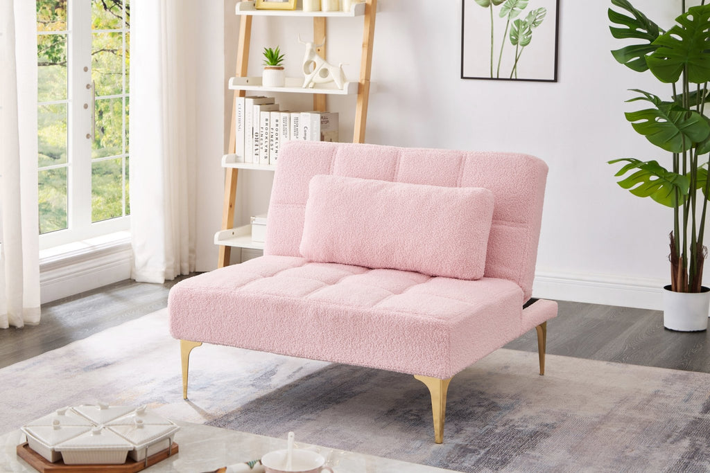 Pink teddy fabric convertible sofa bed with eucalyptus wood frame, showing its plush surface and compact, versatile design in a studio setting.