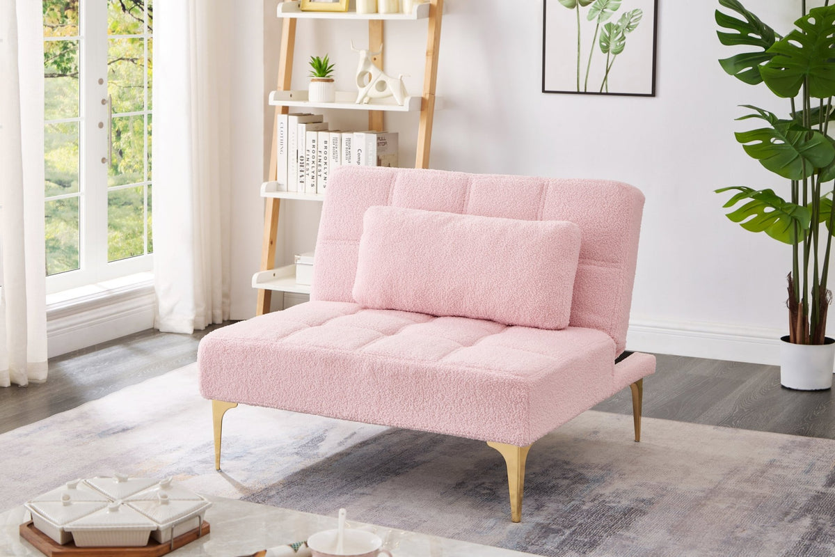 Pink teddy fabric convertible sofa bed with eucalyptus wood frame, showing its plush surface and compact, versatile design in a studio setting.