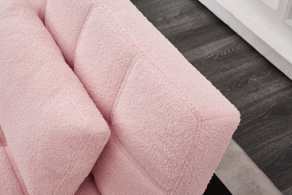 Limited edition pink teddy fabric convertible sofa bed with solid eucalyptus wood frame, suitable for studio spaces by Anthony & Home