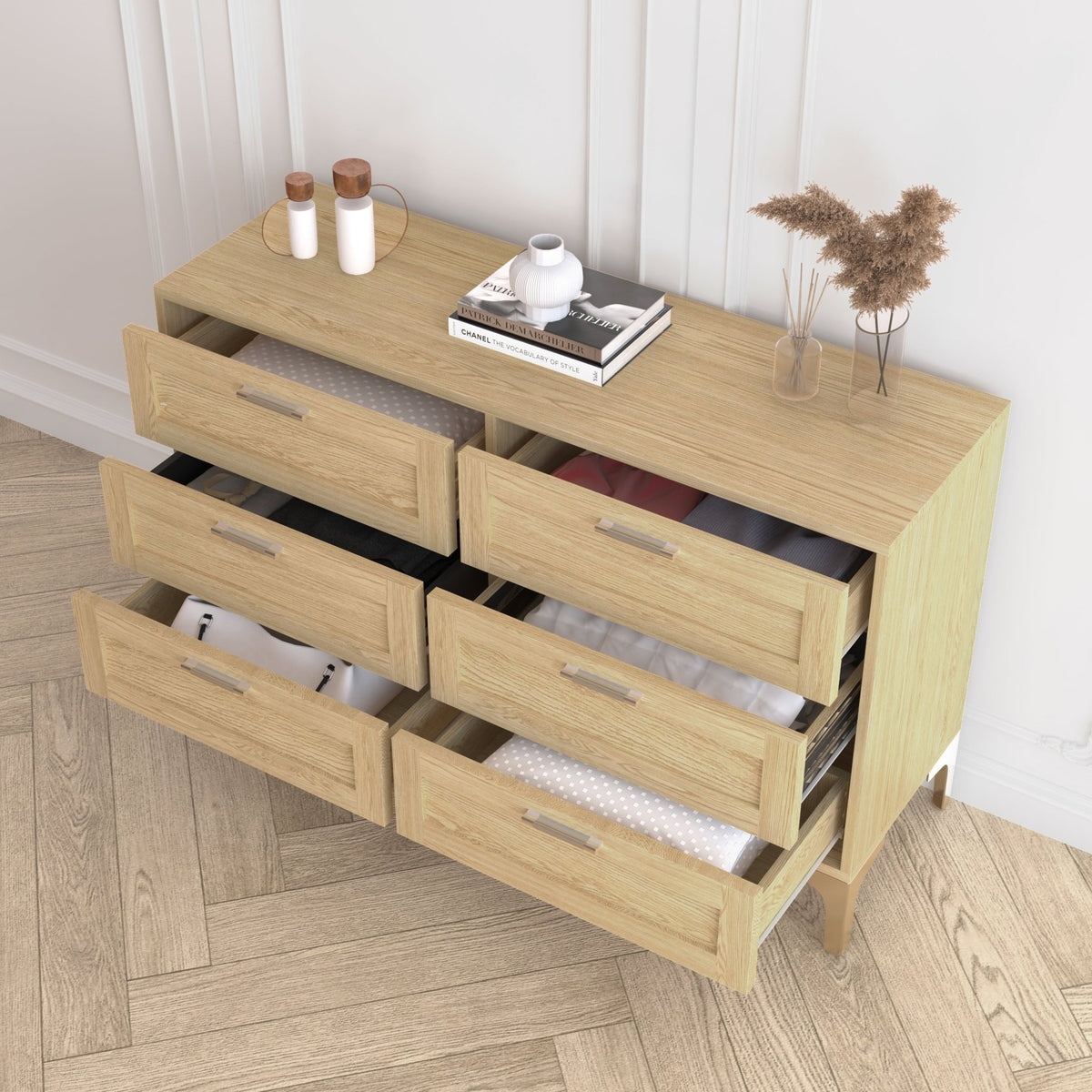 Limited edition light oak six-drawer dresser by Anthony & Home with polished silver legs, showcasing sleek engineered wood design.