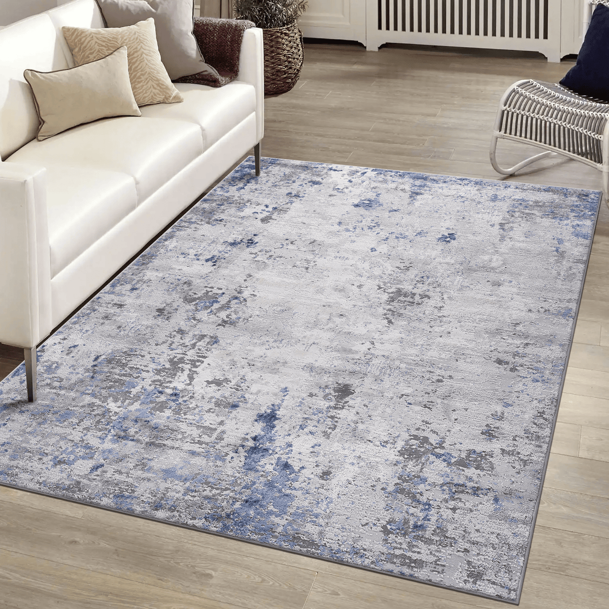 Silver abstract polyester area rug by Loom and Luxe Signature, featuring modern design and soft texture from Anthony & Home.