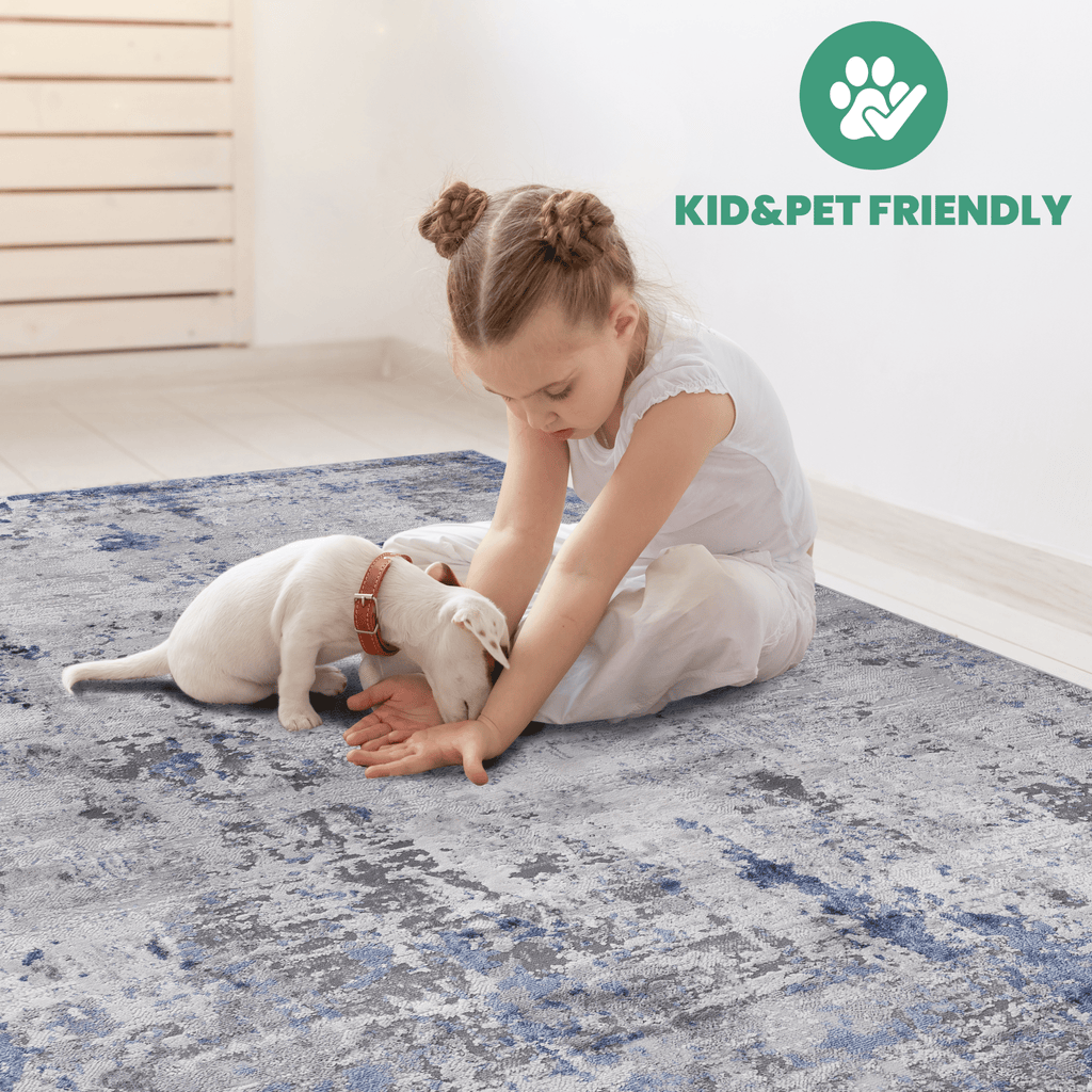 Silver abstract polyester area rug from Loom and Luxe Signature collection by Anthony & Home, showcasing a stylish modern design.