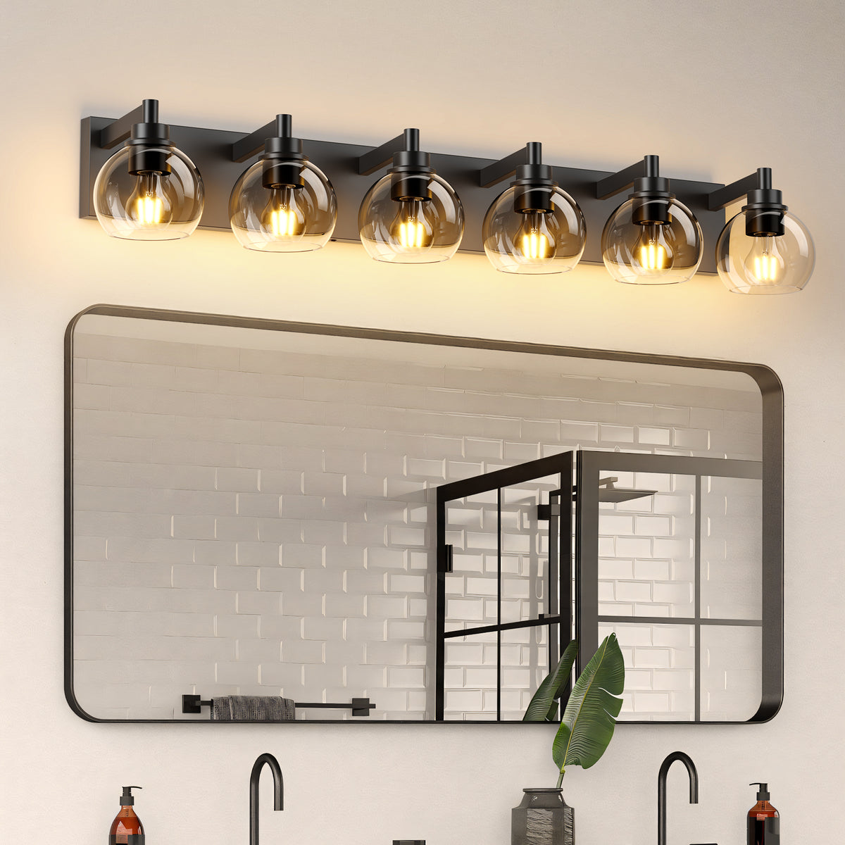 Matte black iron vanity light with glass shade, stylish bathroom or hallway fixture by Anthony & Home.
