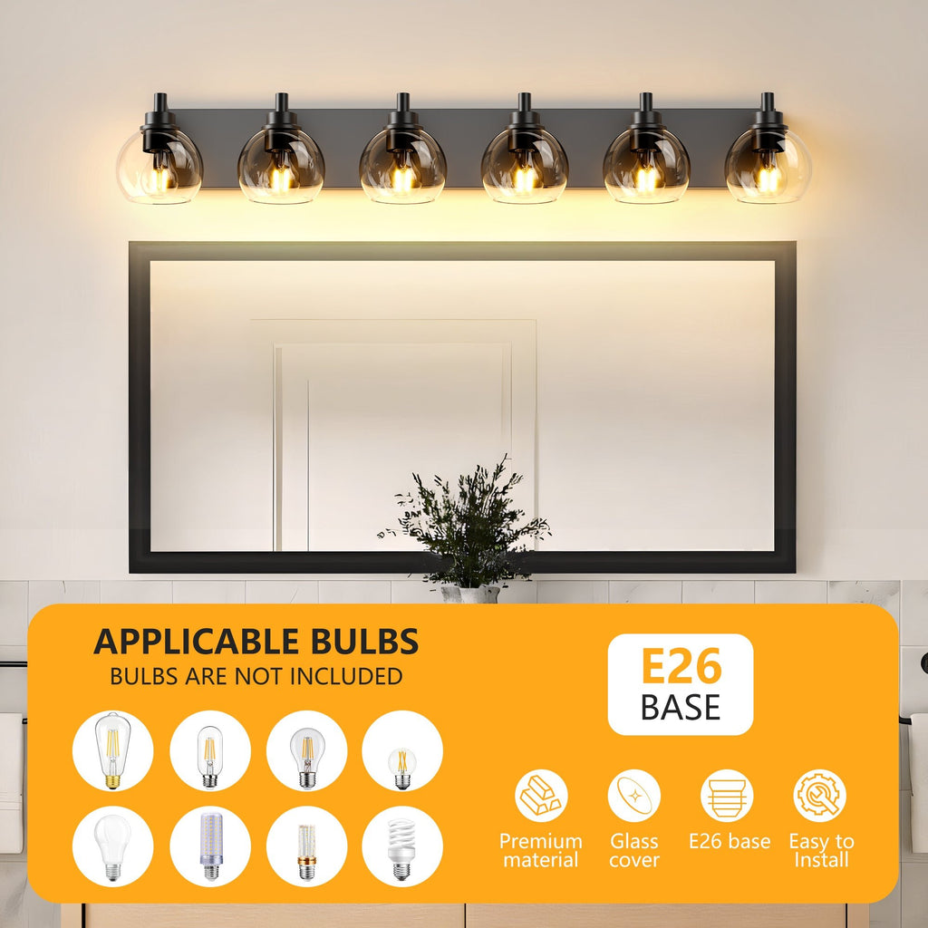 Matte black iron vanity light with glass shade by Anthony & Home, wall-mounted fixture for bathroom or vanity area.