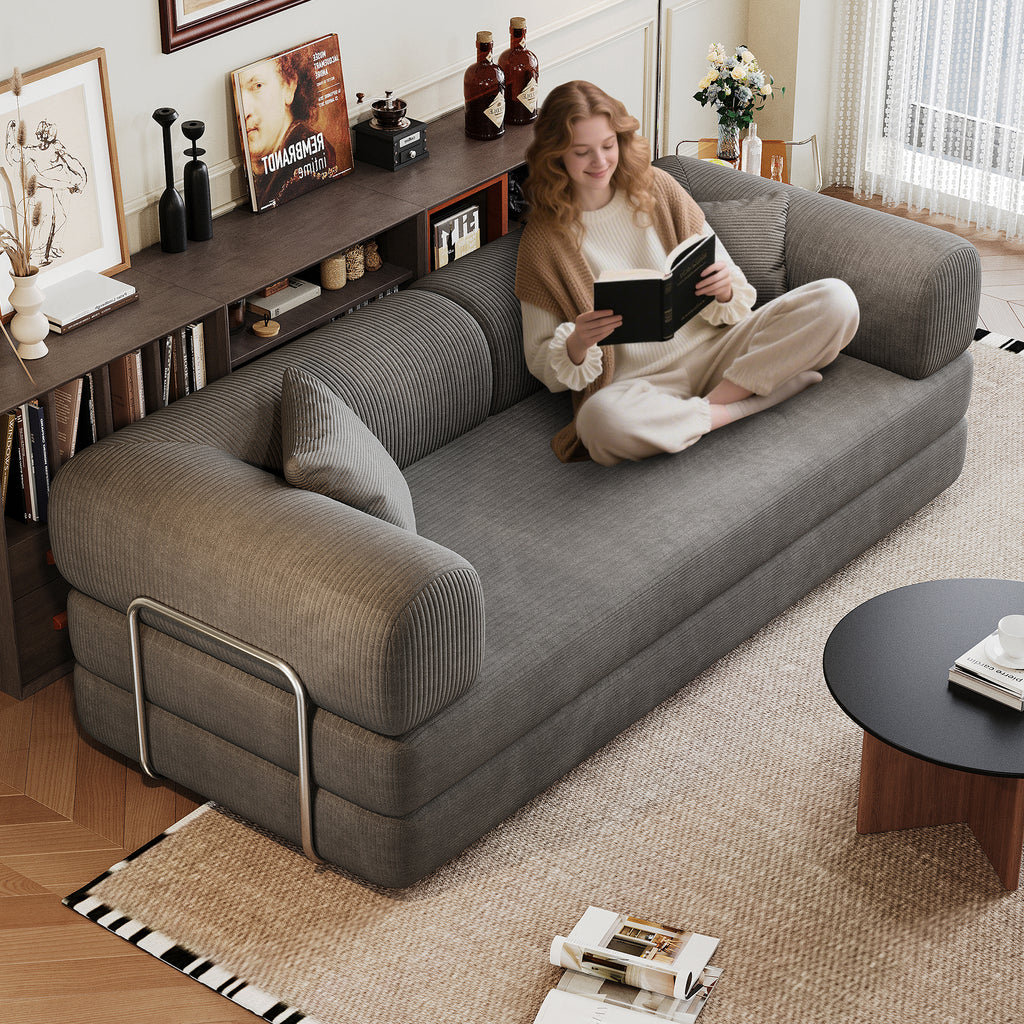 Modular sofa bed from Anthony & Home's Atelier Collection with plush cushions and modern design, shown in a stylish living room setting.