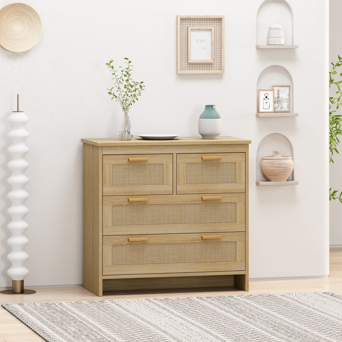 Natural rattan cabinet with four drawers from Anthony & Home's Atelier Collection, showcasing woven rattan paneling and wooden frame.