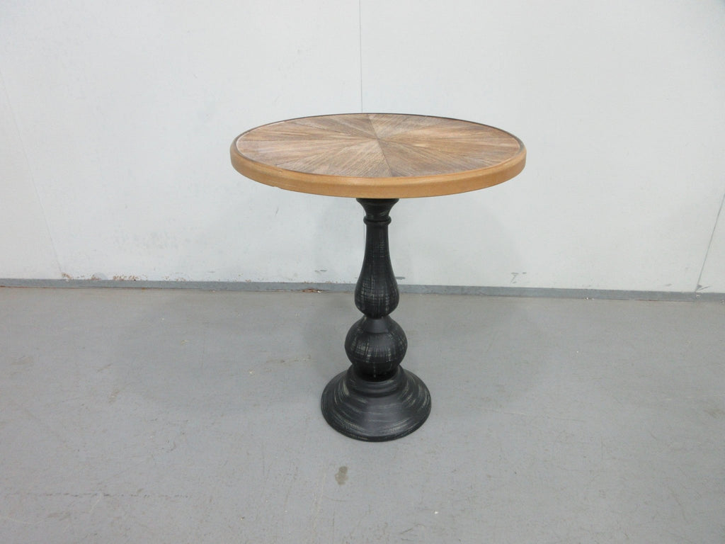 Natural wood tone round end table by Anthony & Home, with sleek wooden surface and modern design for living room decor.