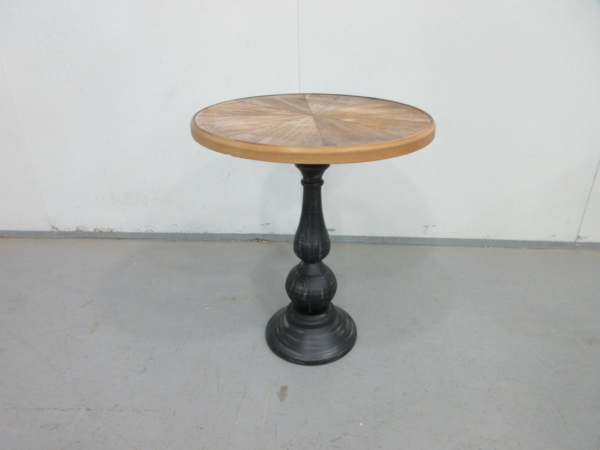Natural wood tone round end table by Anthony & Home, with sleek wooden surface and modern design for living room decor.
