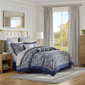 Navy jacquard cotton 12-piece Atelier Comforter Set by Anthony & Home with matching pillow shams and decorative bedding pieces.