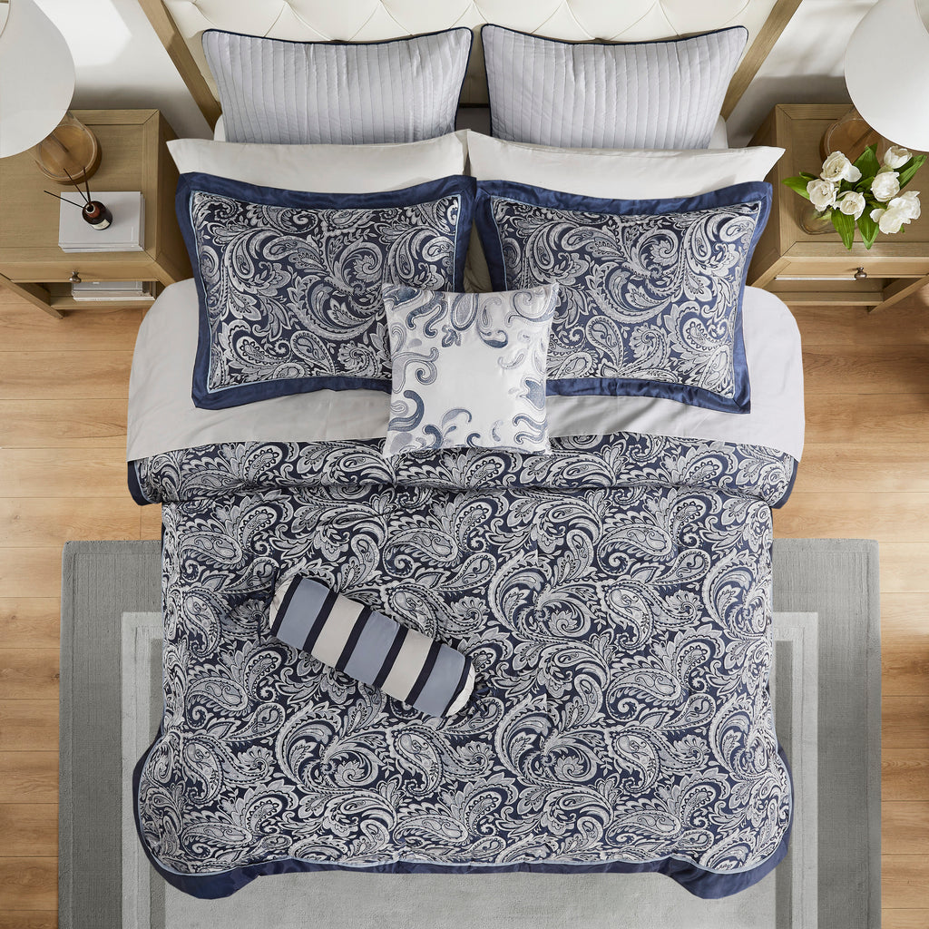Navy jacquard cotton 12-piece Atelier Comforter Set by Anthony & Home with decorative patterns and matching pillow shams.
