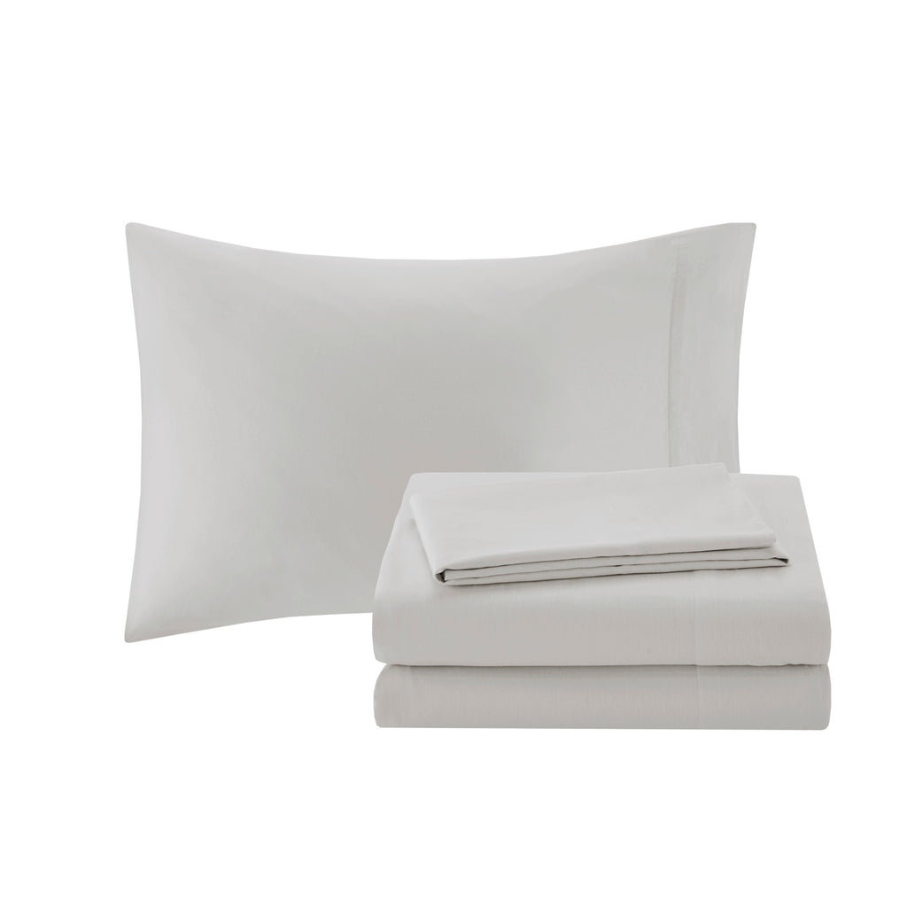 Navy jacquard cotton 12-piece Atelier Comforter Set by Anthony & Home with intricate woven patterns on bed linens