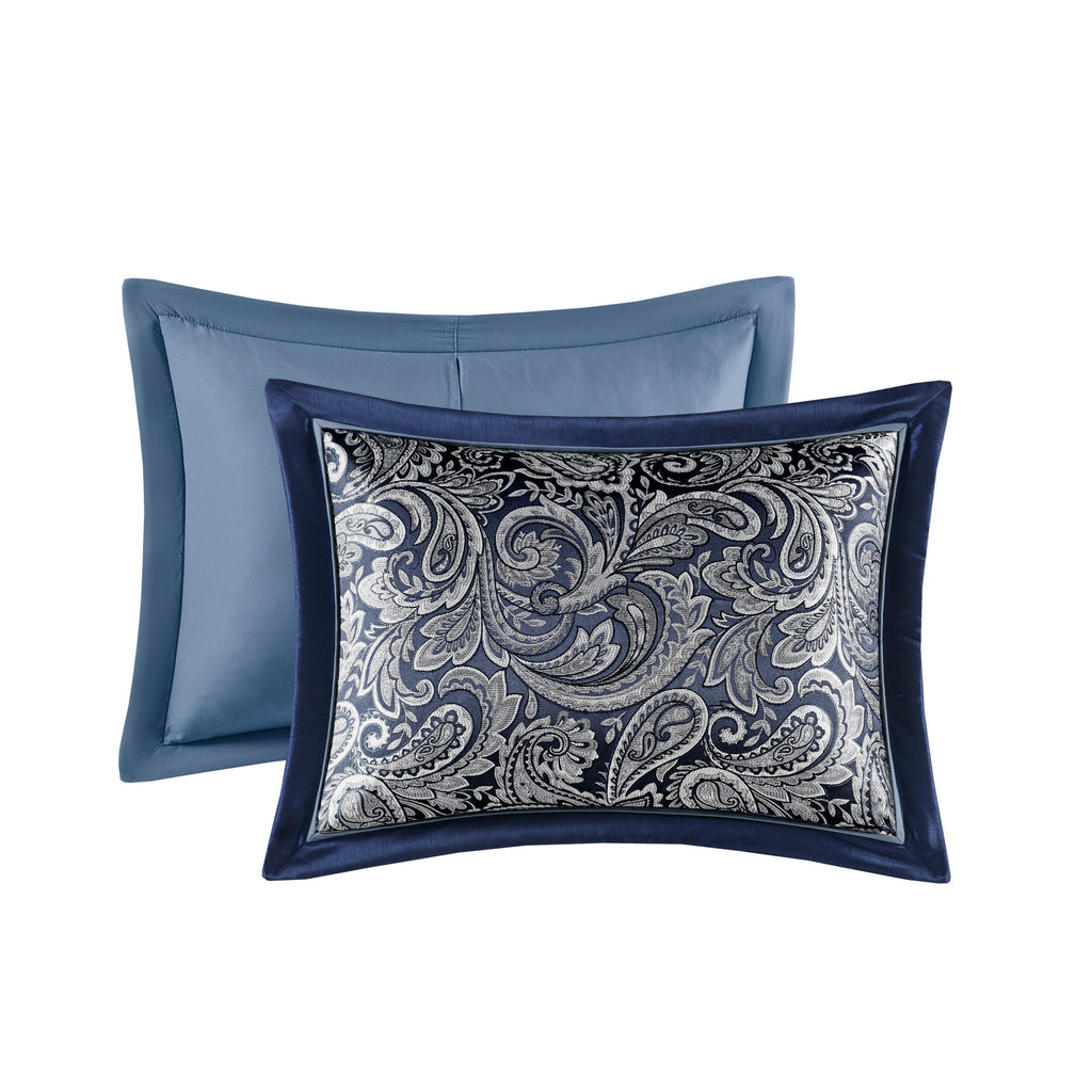 Navy jacquard cotton 12-piece Atelier Comforter set with decorative pillows on a bed, showcasing elegant bedding design.