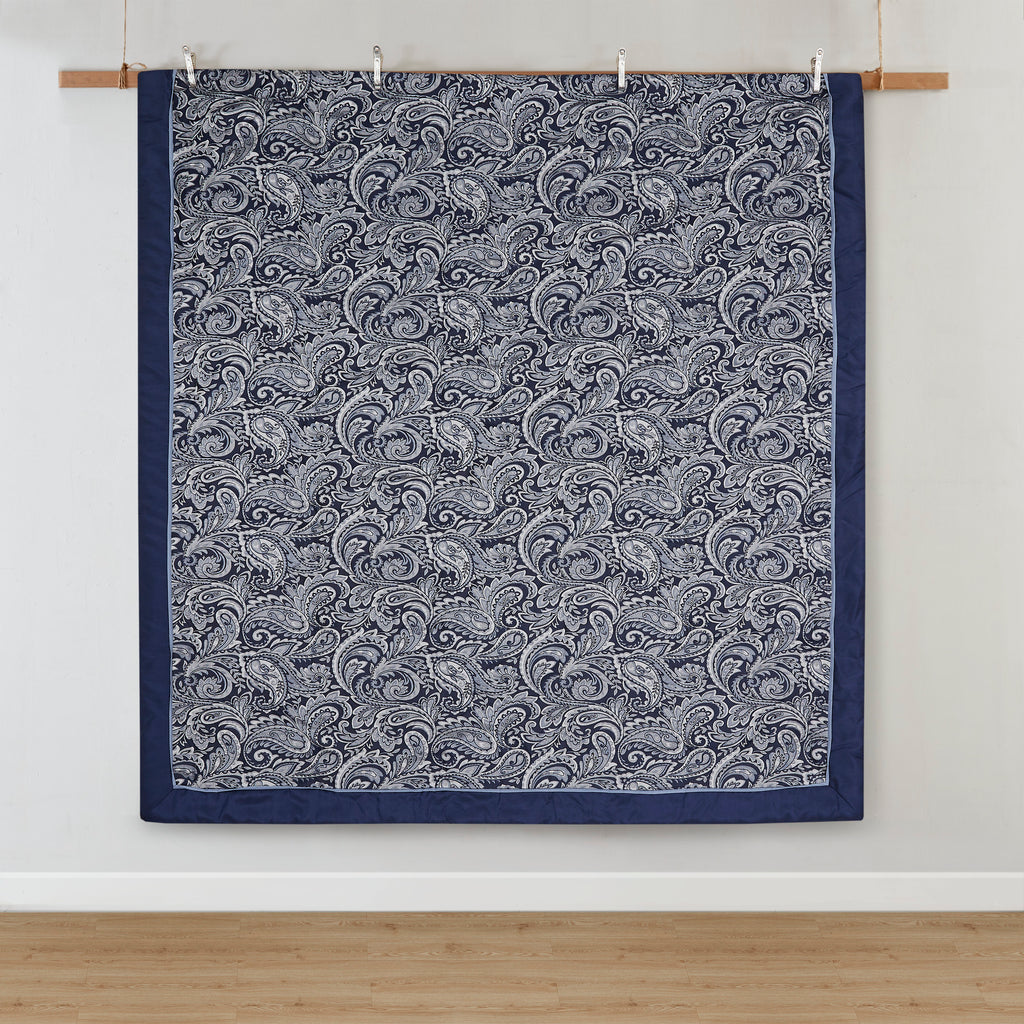 Navy jacquard cotton 12-piece Atelier Comforter Set by Anthony & Home displayed on a bed with pillows and bedding