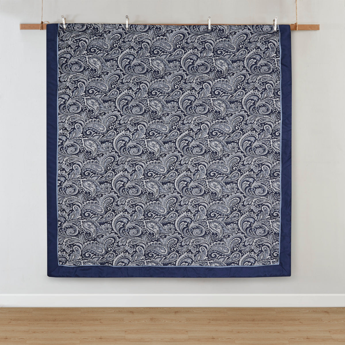 Navy jacquard cotton 12-piece Atelier Comforter Set by Anthony & Home displayed on a bed with pillows and bedding