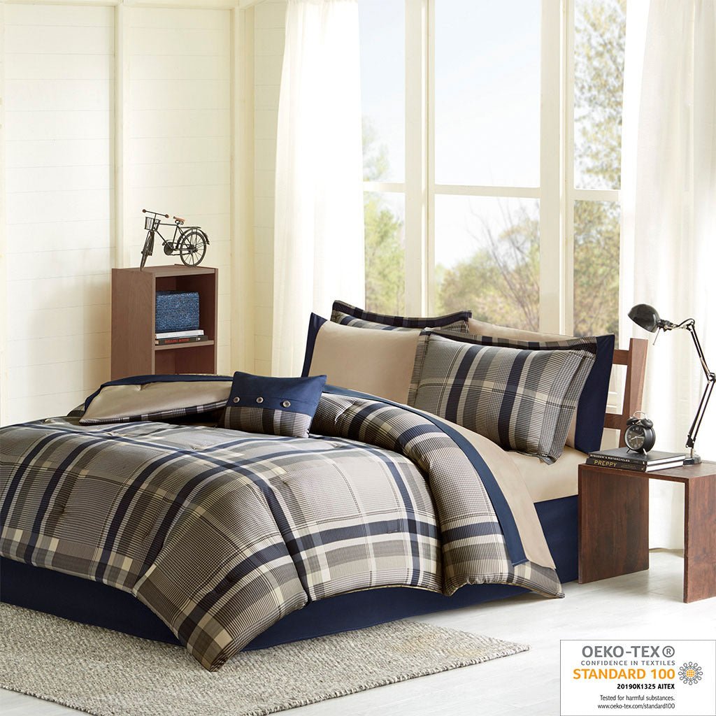 Navy Twin XL brushed microfiber comforter set from Anthony & Home with matching pillow shams on a bed.