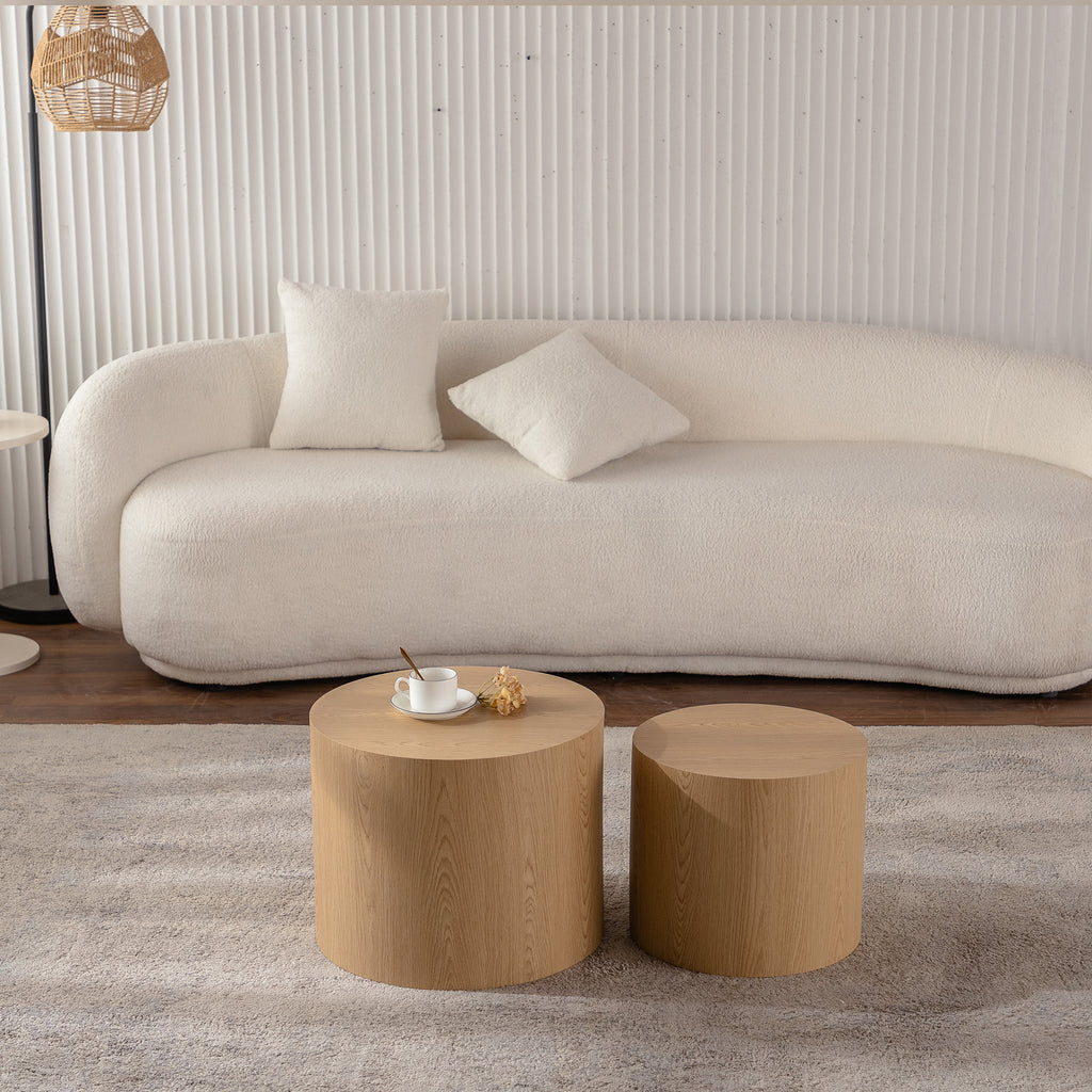 Set of two Anthony & Home nesting round coffee tables with wooden tops and black metal legs, ideal for modern living rooms.