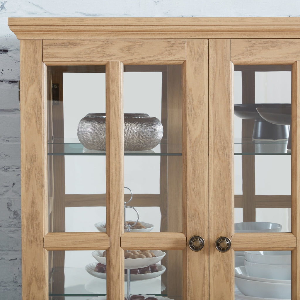 Anthony & Home Oak Curio Cabinet with glass doors, showcasing elegant wooden shelves and a classic design for display.