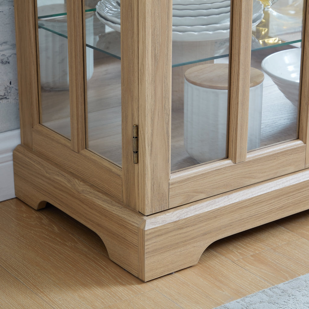 Elegant oak curio cabinet with glass doors from Anthony & Home, showcasing a classic, stylish display piece for collectibles.
