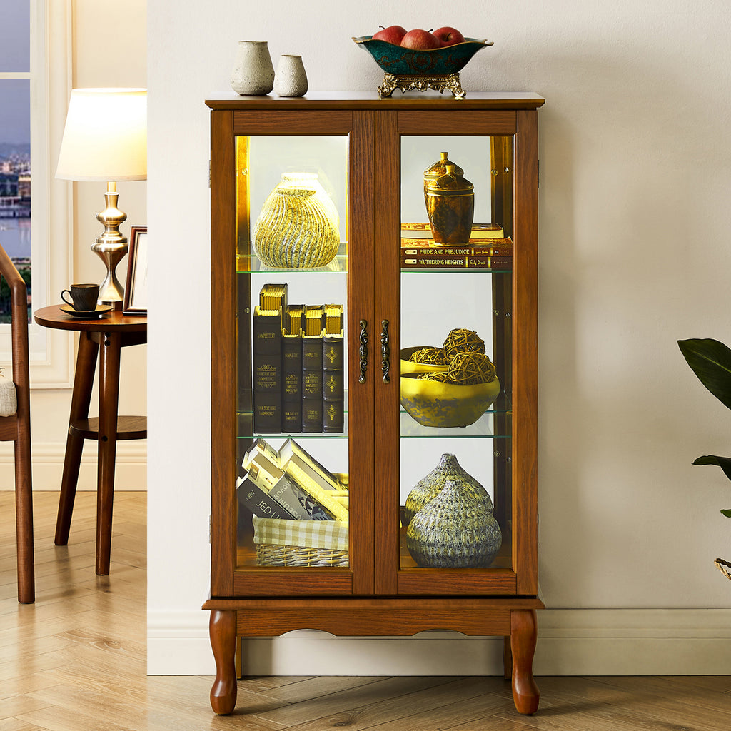 Oak finish lighted curio cabinet with mirrored back and glass shelves, showcasing collectible display space by Anthony & Home