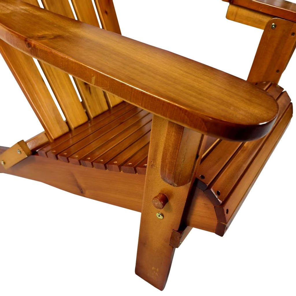 Oak folding Adirondack chair by Anthony & Home, limited edition, featuring wide armrests and a rustic finish in a natural outdoor setting.