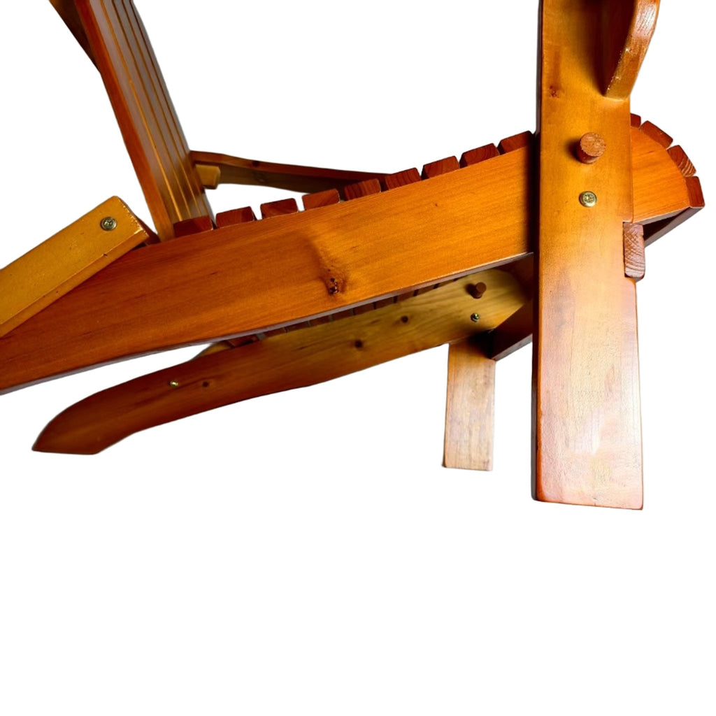Limited edition Oak folding Adirondack chair by Anthony & Home, showcasing a classic wooden outdoor lounge seat in natural finish.