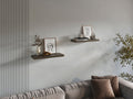 Olive finish floating shelves by Anthony & Home mounted on a wall, showcasing modern minimalistic design for home storage.
