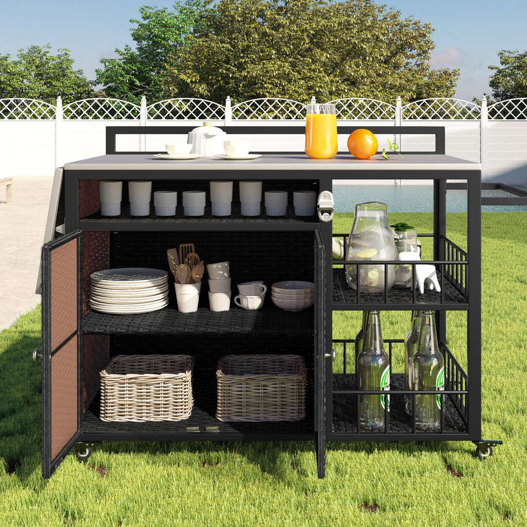 Outdoor kitchen island with storage and folding tabletop in dark brown PE rattan from Anthony & Home's premium collection.
