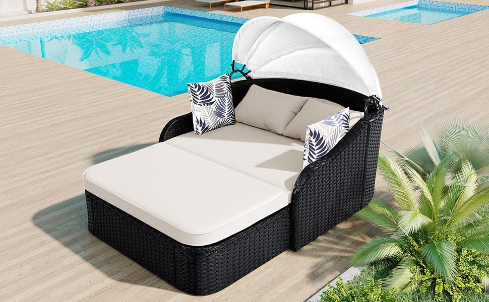 Outdoor sunbed with adjustable canopy, PE rattan material, by Anthony & Home, featuring a modern design for relaxing outdoor spaces.