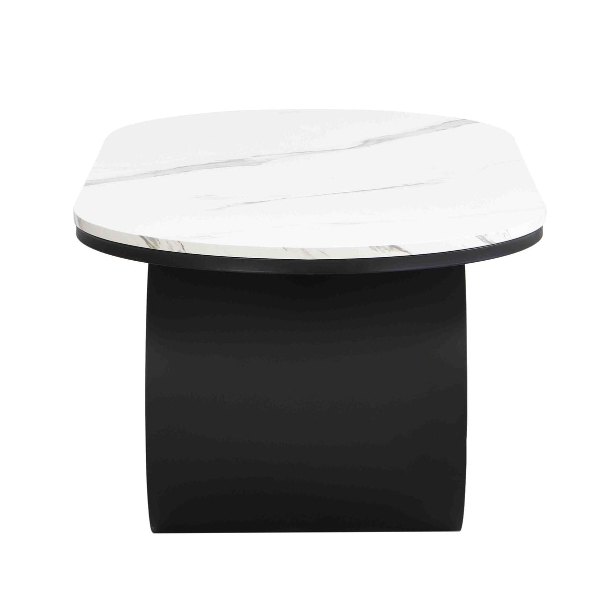 Oval coffee table with faux marble top and black metal frame in a modern studio setting, by Anthony & Home.
