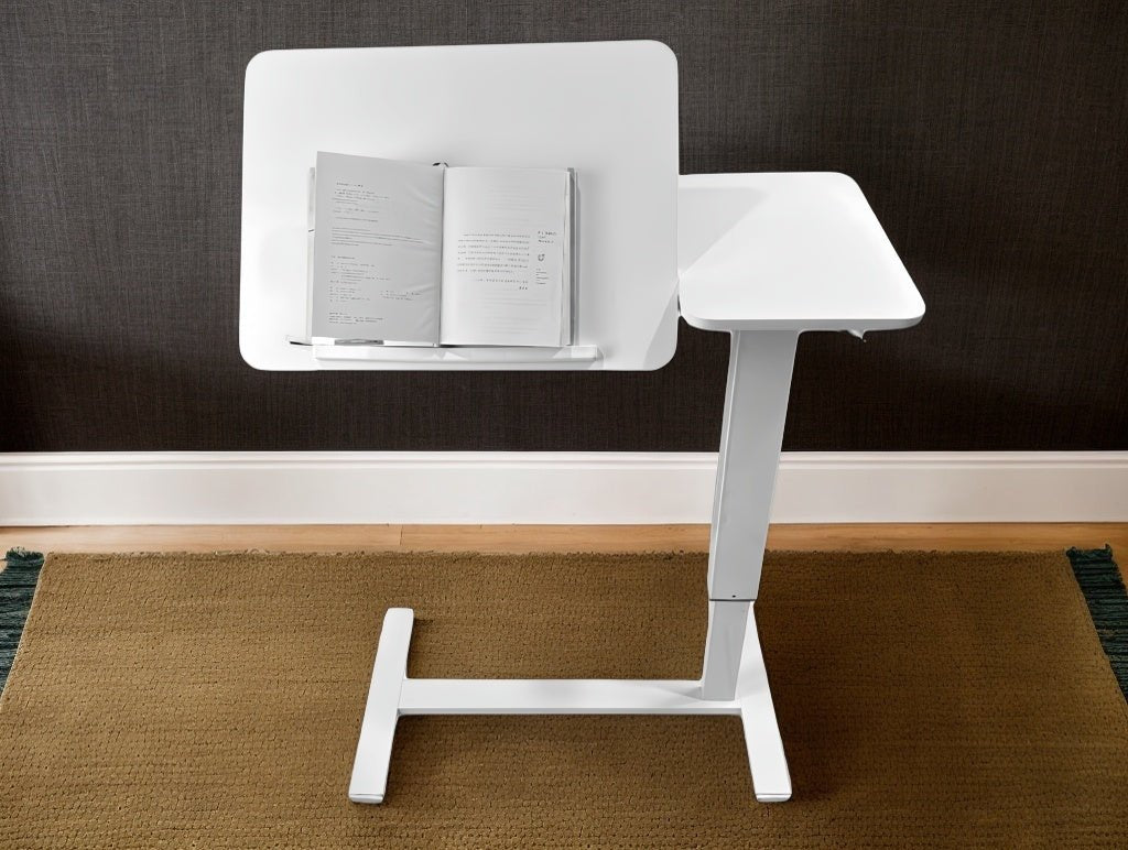 White MDF and metal overbed bedside desk from Anthony & Home Atelier Edition, modern luxury design, sturdy and functional.