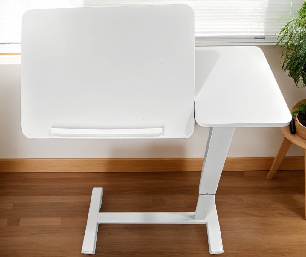 White MDF and metal overbed bedside desk from Anthony & Home's Atelier Edition, modern luxury design for convenient bedside use.