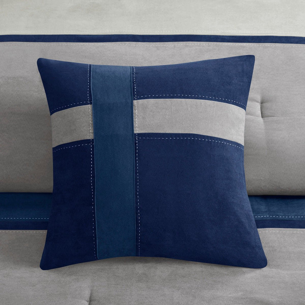 King-sized Anthony & Home Palisades faux suede comforter set in blue with 7 pieces, showcasing elegant craftsmanship and plush texture.