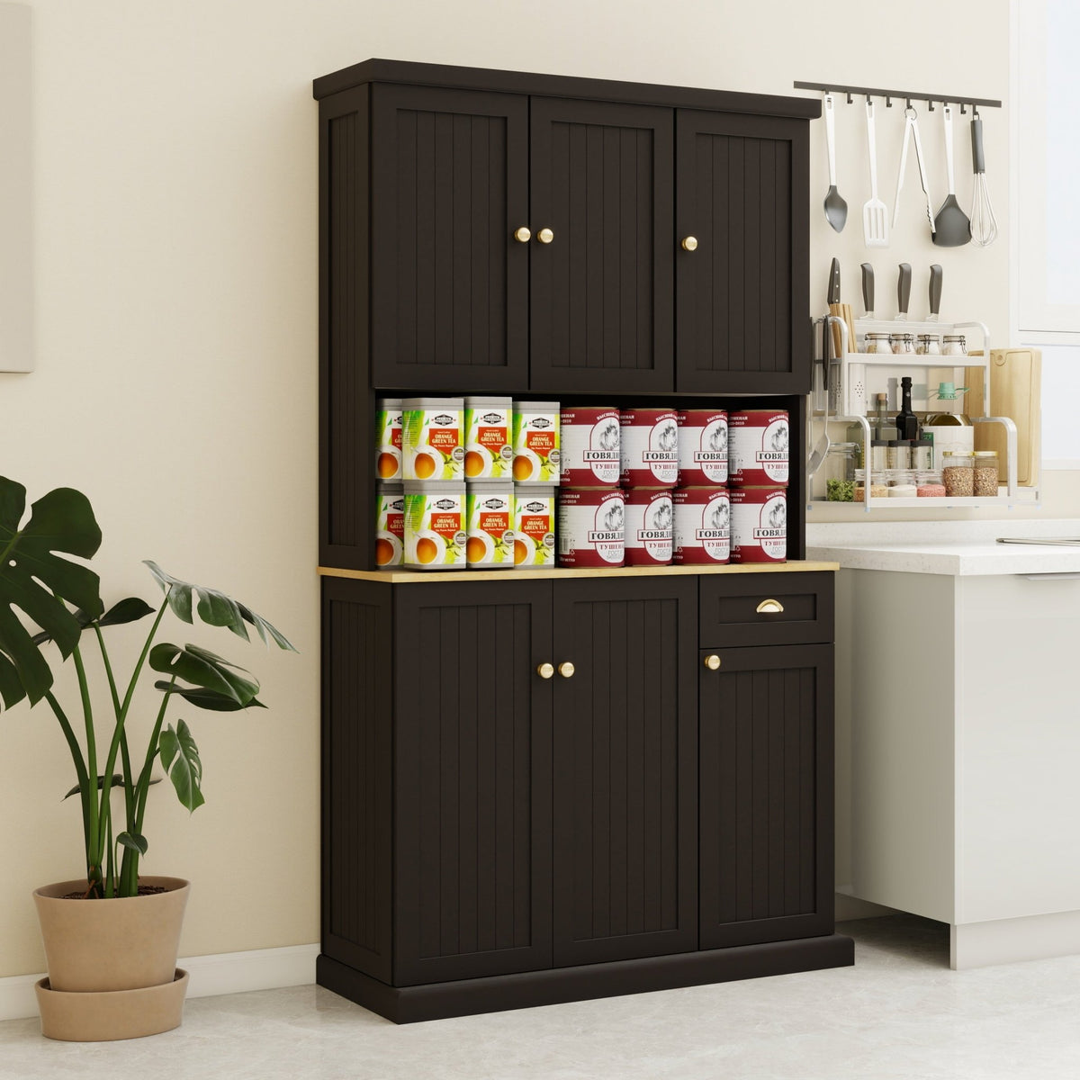 Anthony & Home black matte pantry storage cabinet with microwave countertop, 6 doors, and one drawer, featuring sleek modern design.