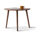Pebble-shaped coffee table by Anthony & Home with walnut finish, mid-century modern design, limited edition piece.