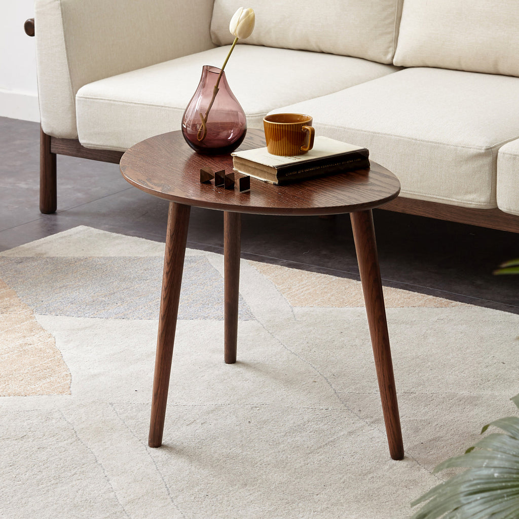 Pebble-shaped coffee table with walnut finish, mid-century modern design by Anthony & Home, limited edition decorative furniture piece.